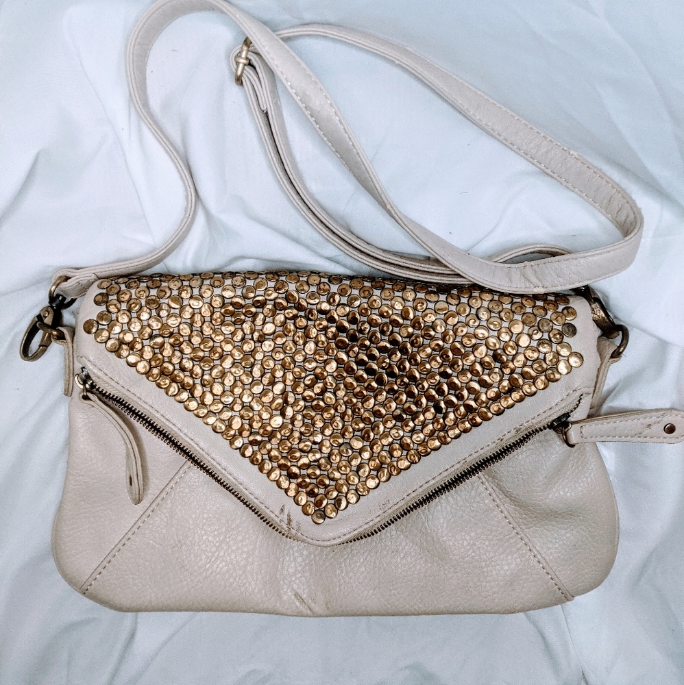 Urban Outfitters leather embellished shoulder bag.